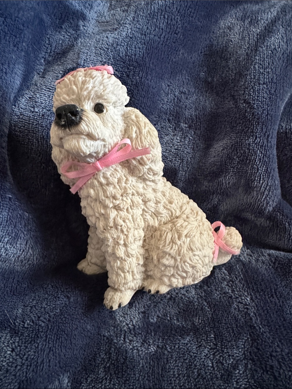 Plush Cream Dog Figurine with Pink Ribbon - Decorative Pet Statue
